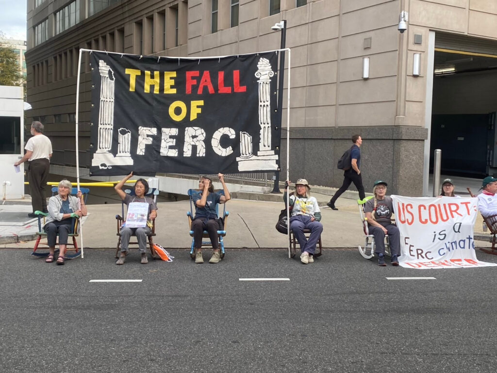 Elders blockade the driveway of FERC